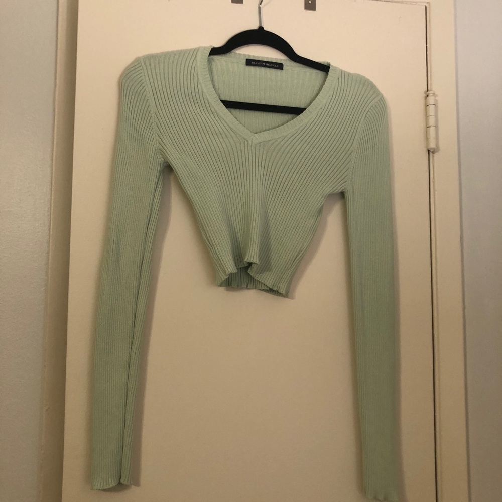 Cropped light green sweater